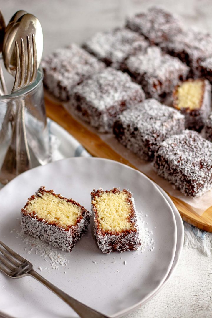 Lamington cut in half on a plate