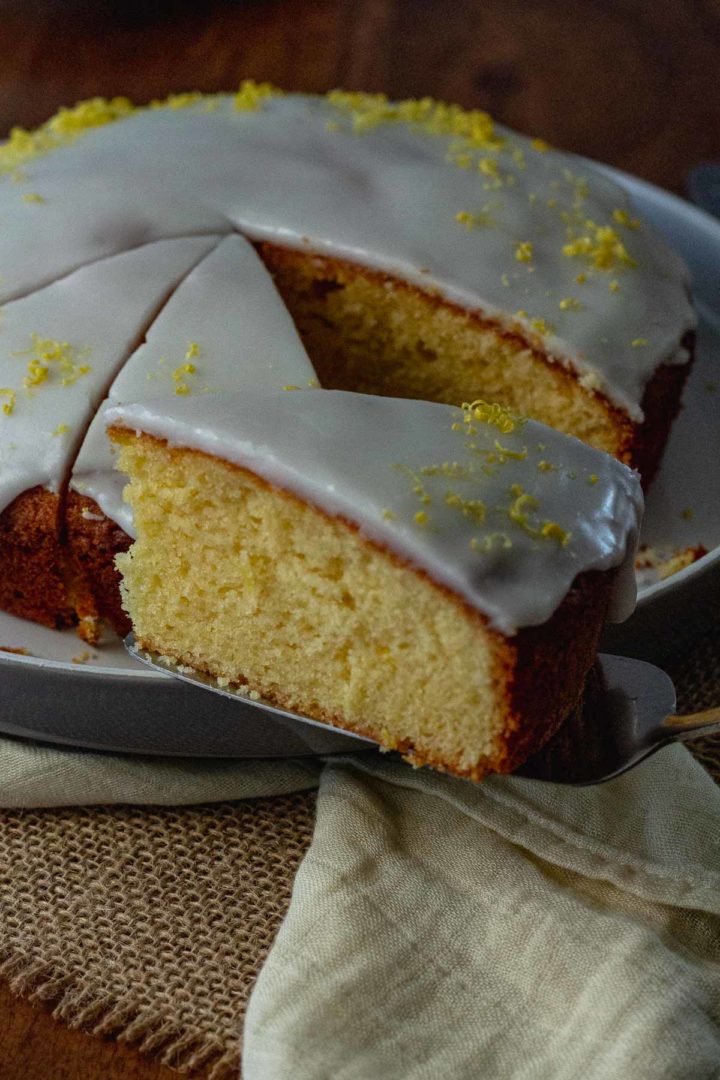 Slice of lemon cake with lemon glaze