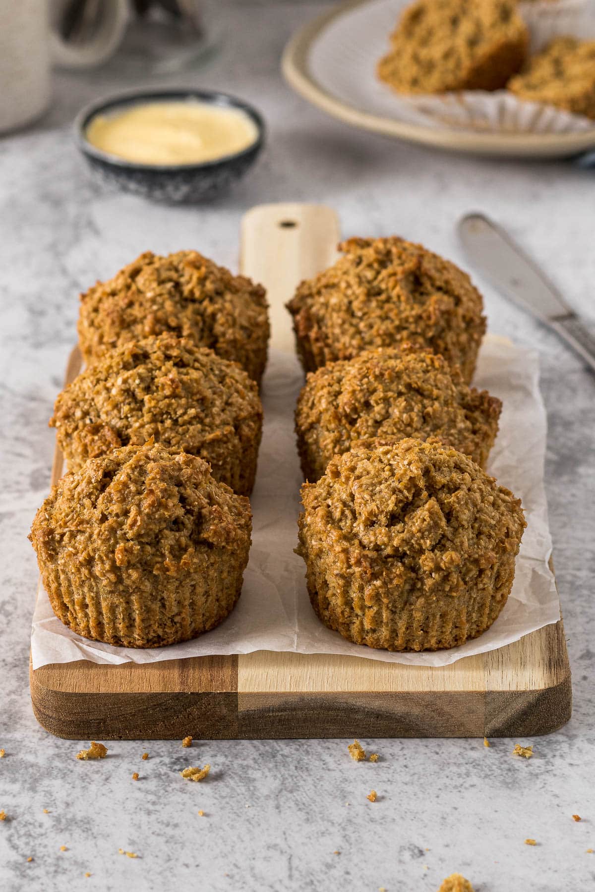 Bran muffins on a serving platter.