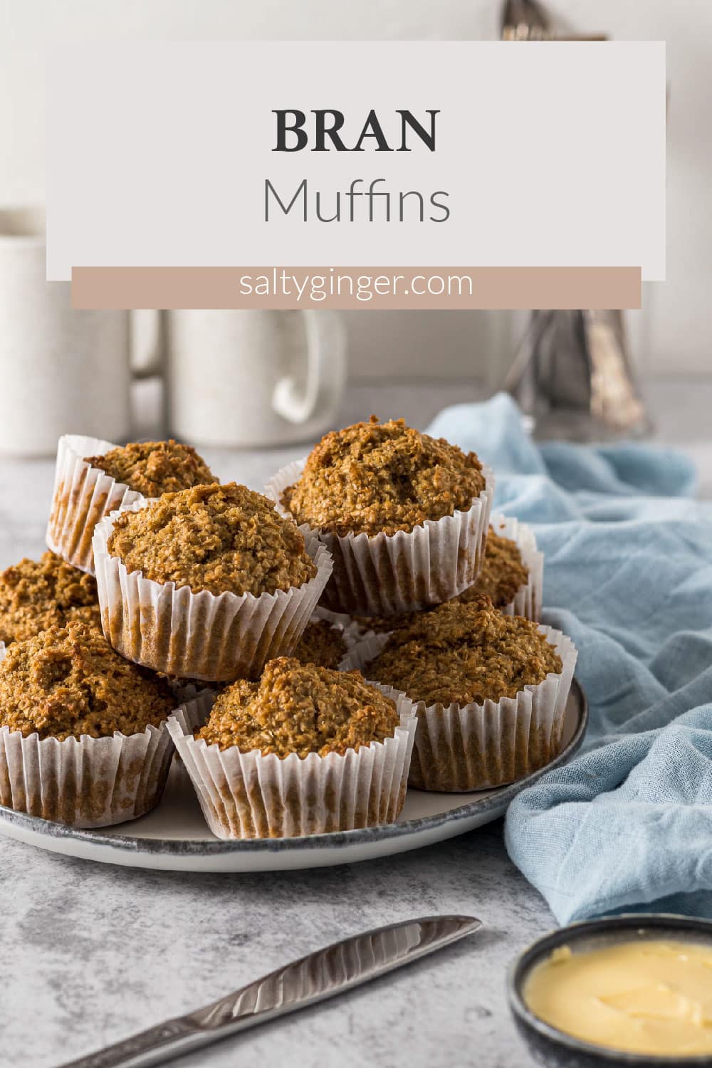 Bran muffins piled on a plate.