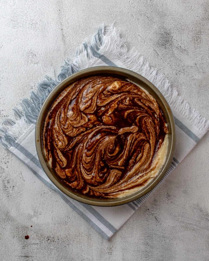Cinnamon Roll Cake Step 5 - Cinnamon sugar swirled into vanilla sponge