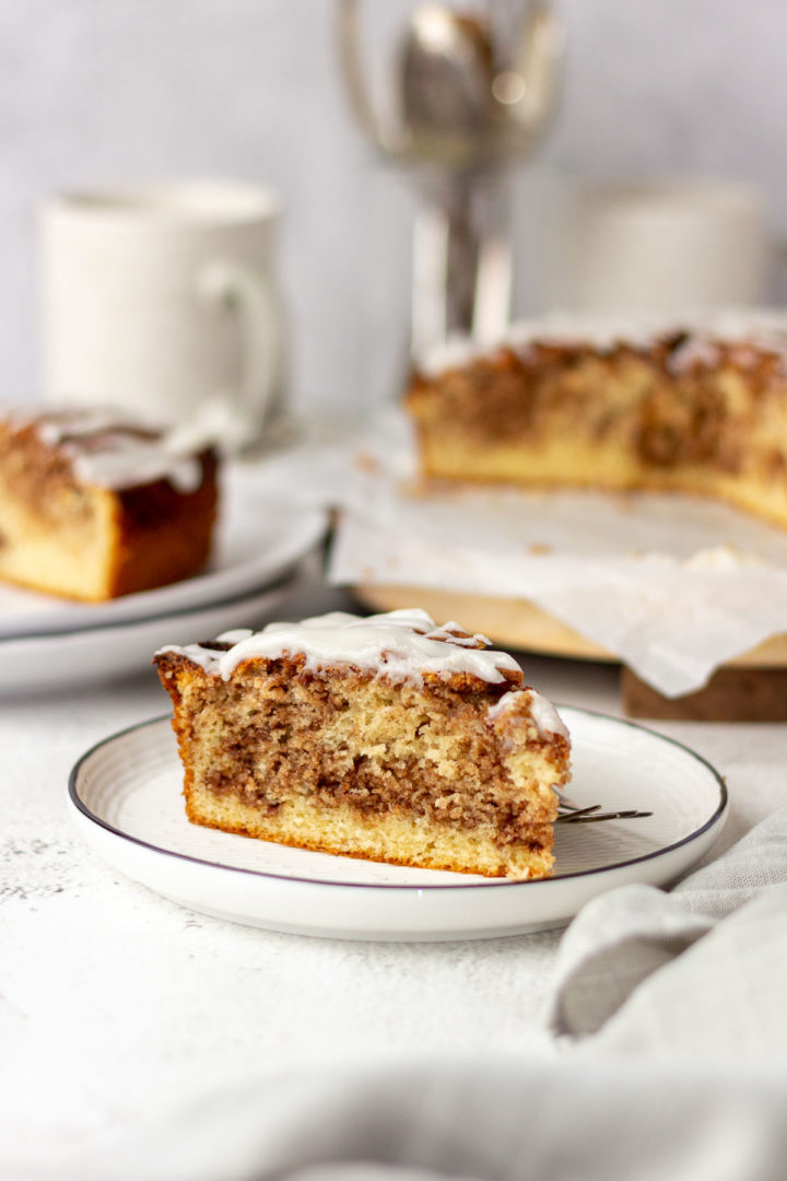 Slice of Cinnamon Roll Cake on a Plate