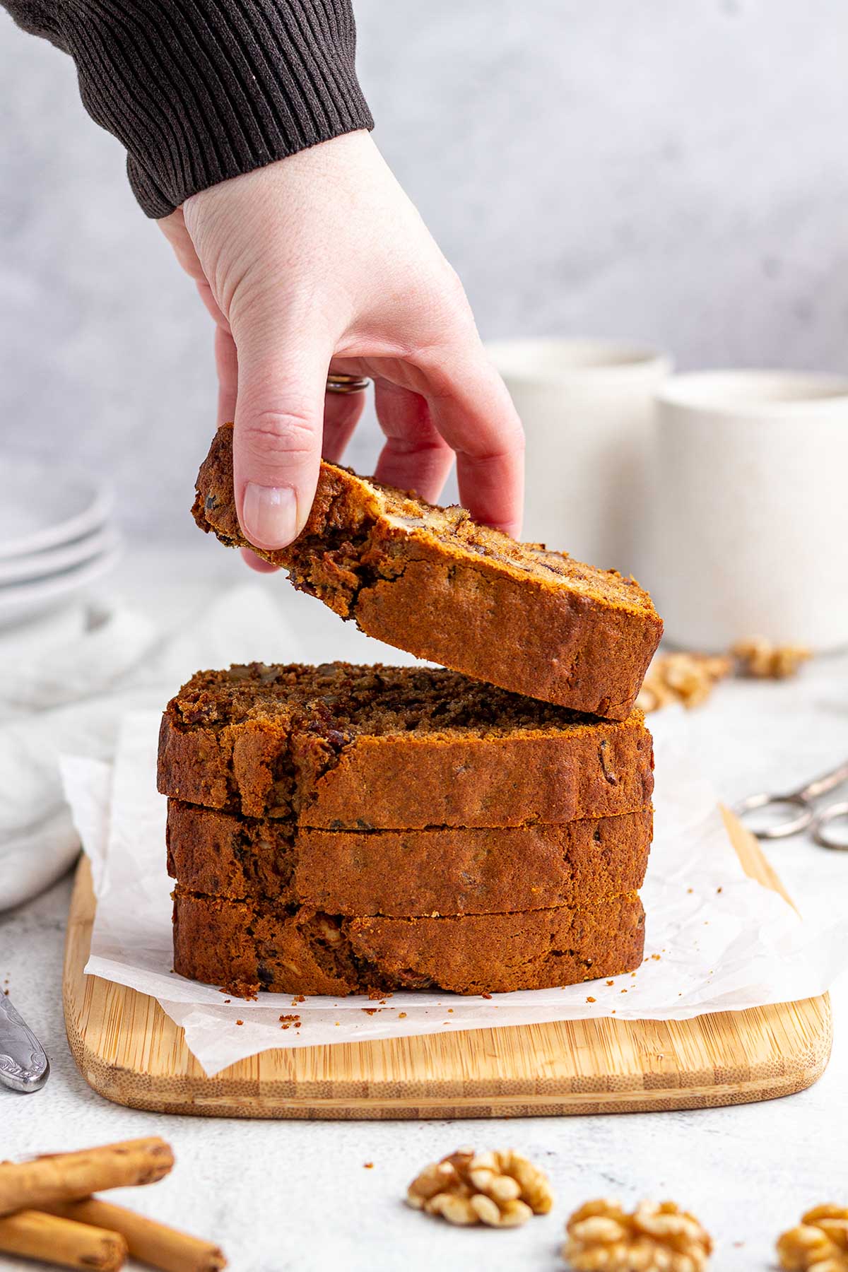 Sliced and stacked date and nut loaf.