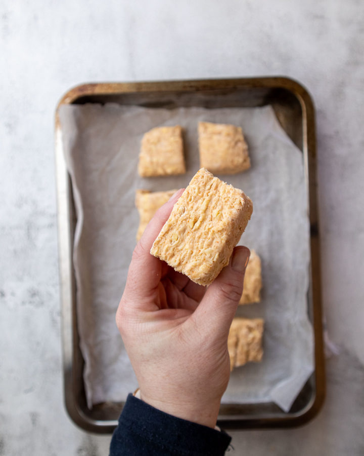 Step 6 - Cut Scones before Baking held up to show the lamination of the dough