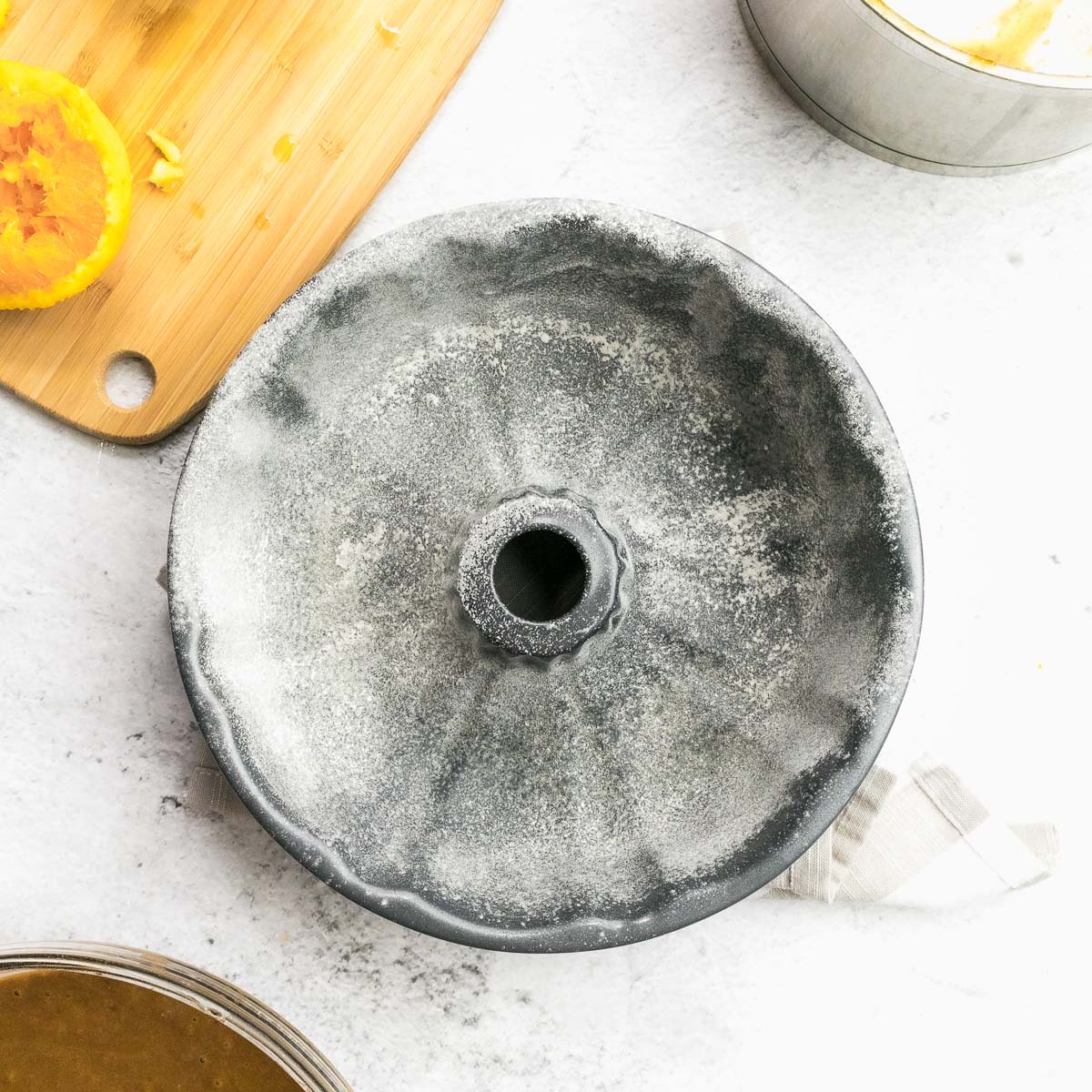 Greased and floured bundt pan