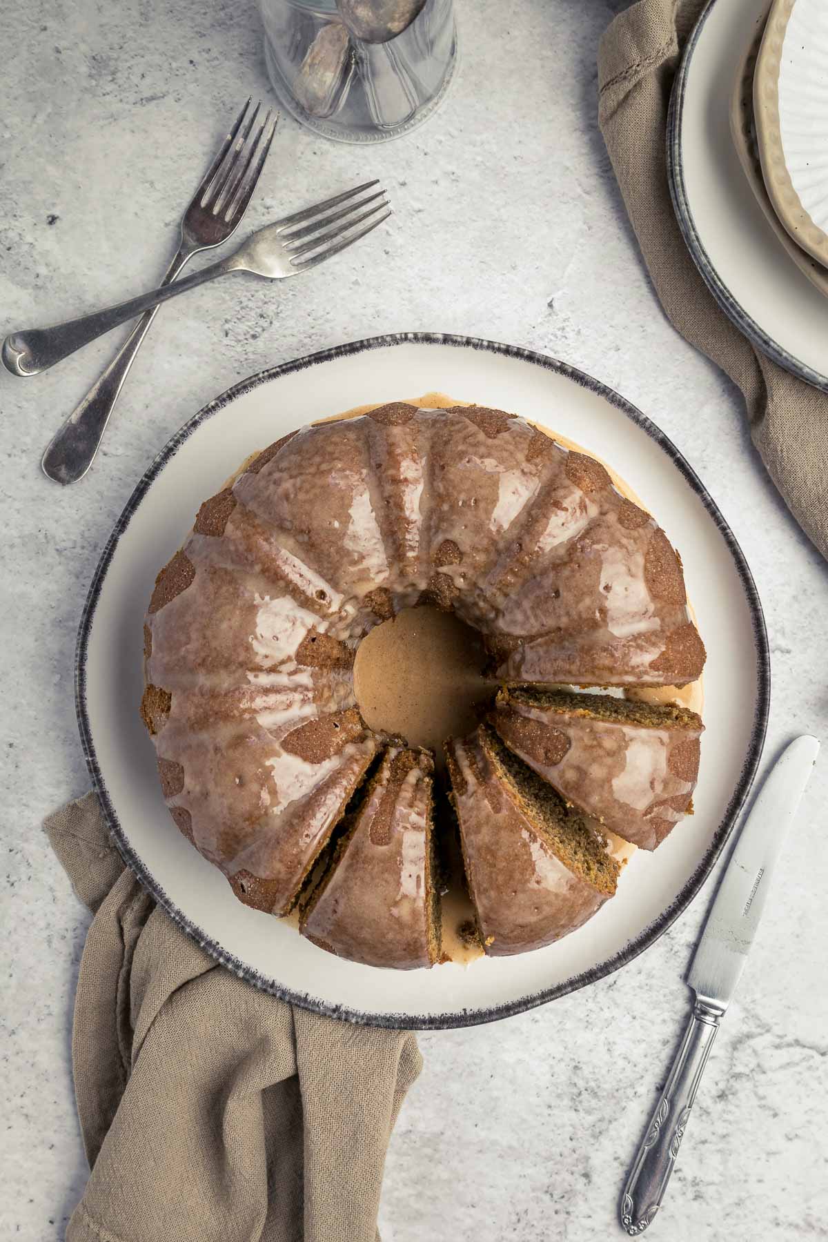 Top down view of orange gingerbread cake with slices