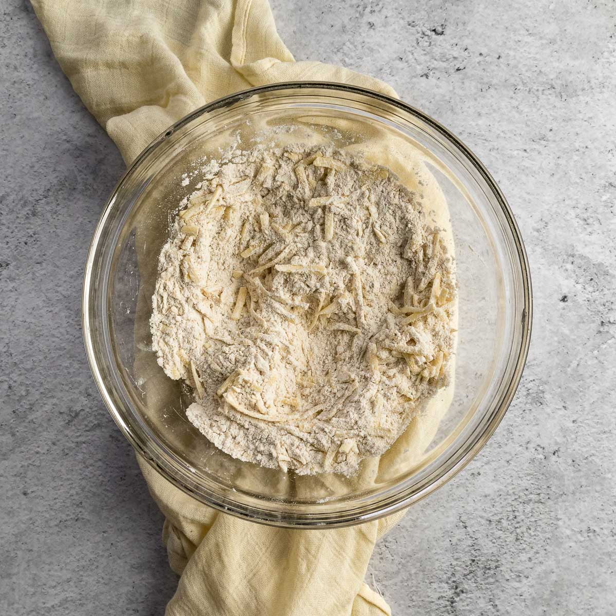 Step 2 - flour, baking powder, salt and spices whisked together. Cheese added and stirred through