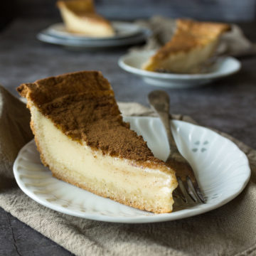 Slice of Milk Tart on a plate.