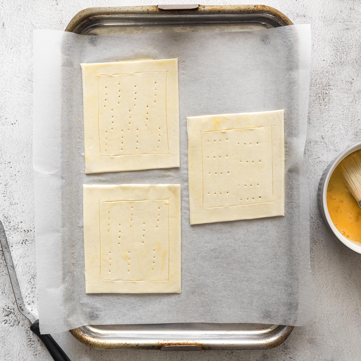 Step 3 - Scored and docked puff pastry