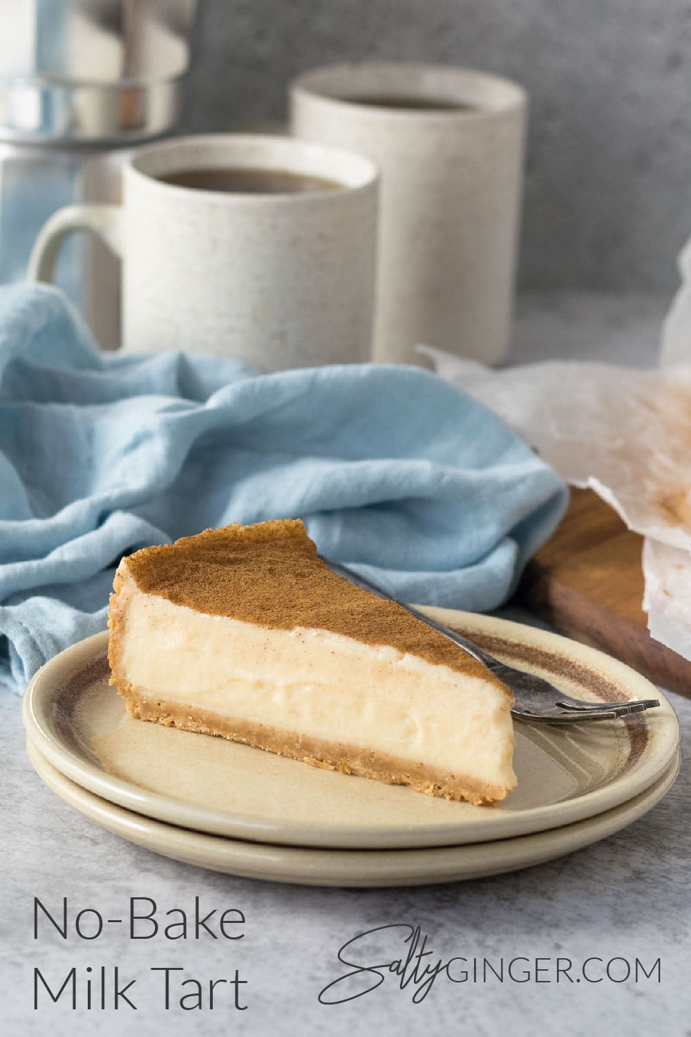 Slice of no-bake milk tart on a plate.