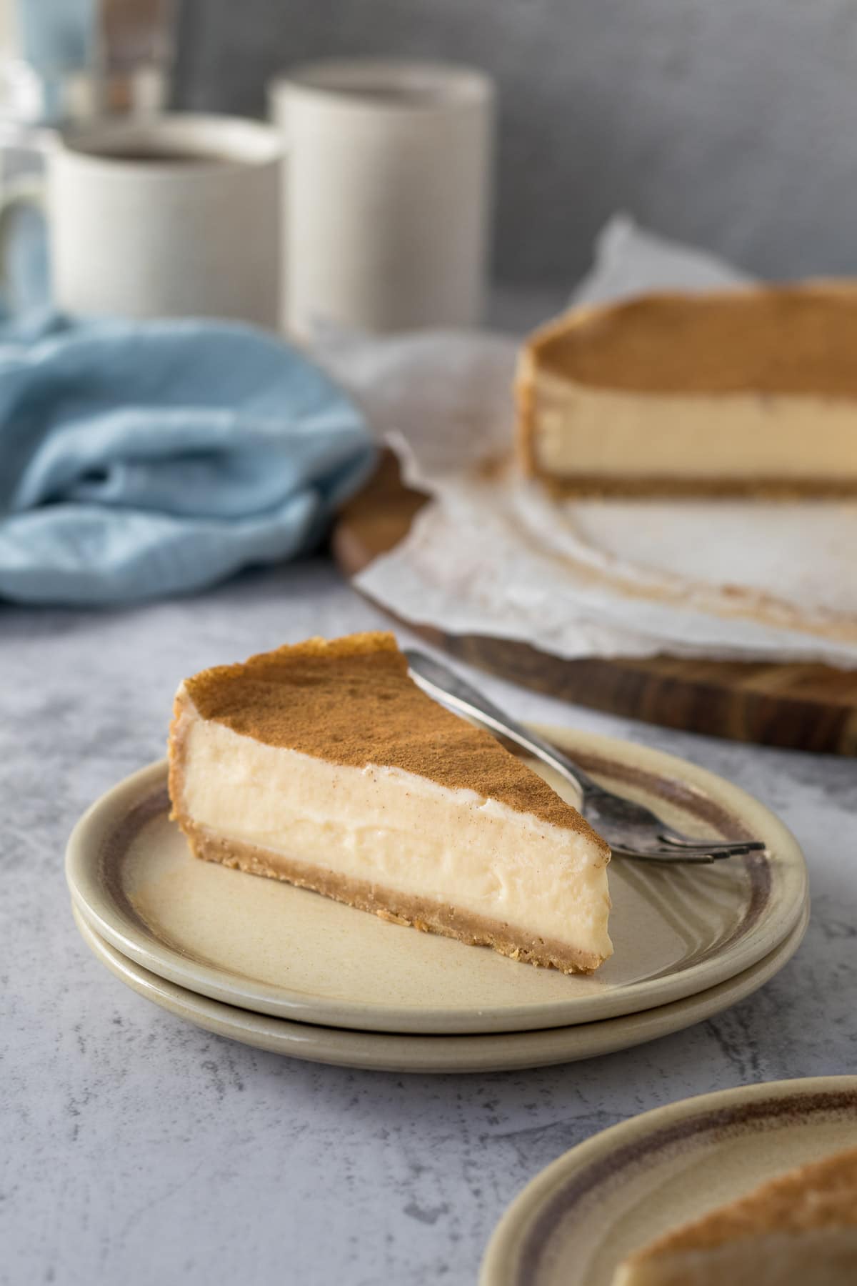 Slice of no-bake milk tart on a plate.