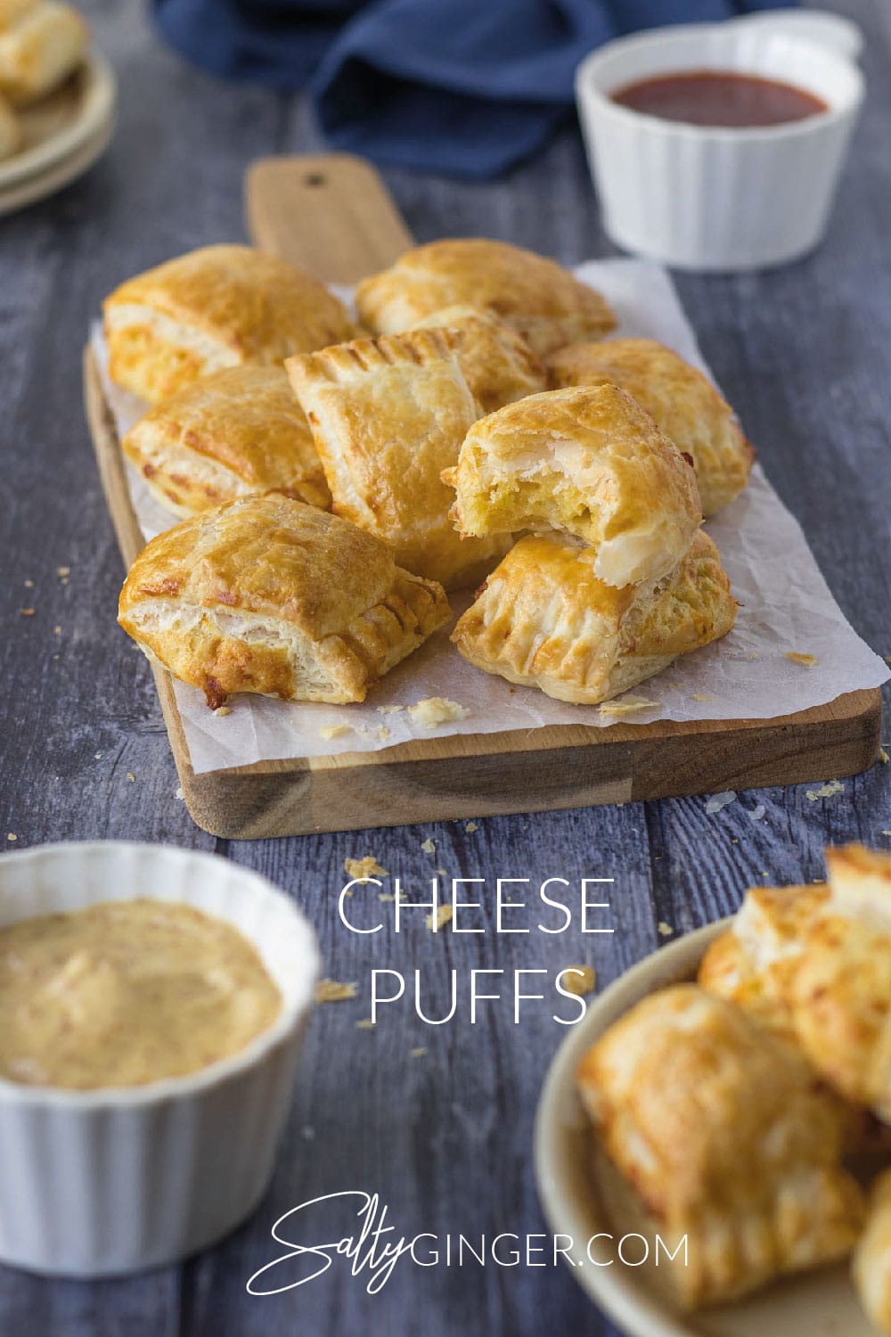 Mini cheese rolls on a platter.