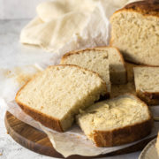Slices of potbrood on a cutting board.
