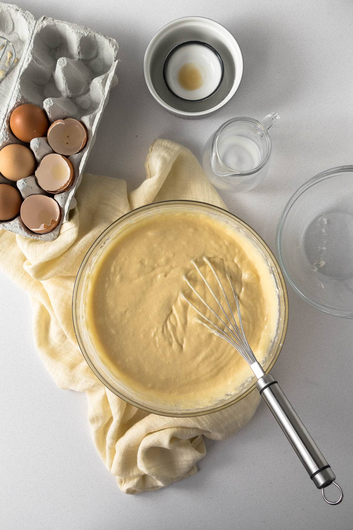Vanilla cake batter in a bowl.