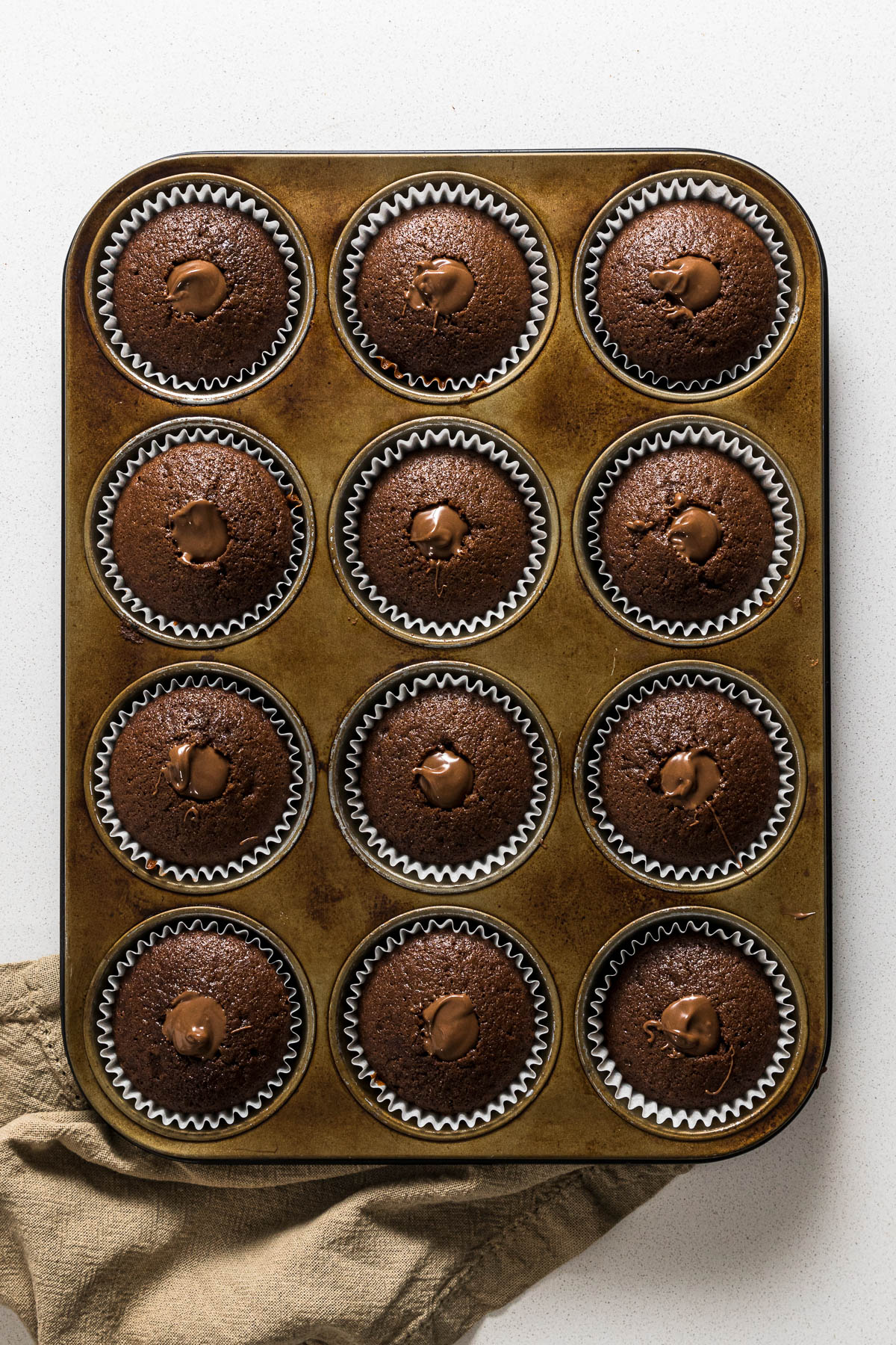 Chocolate cupcakes stuffed with Nutella.