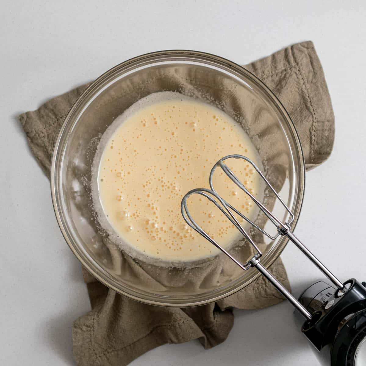 Eggs, milk, melted butter whisked together.