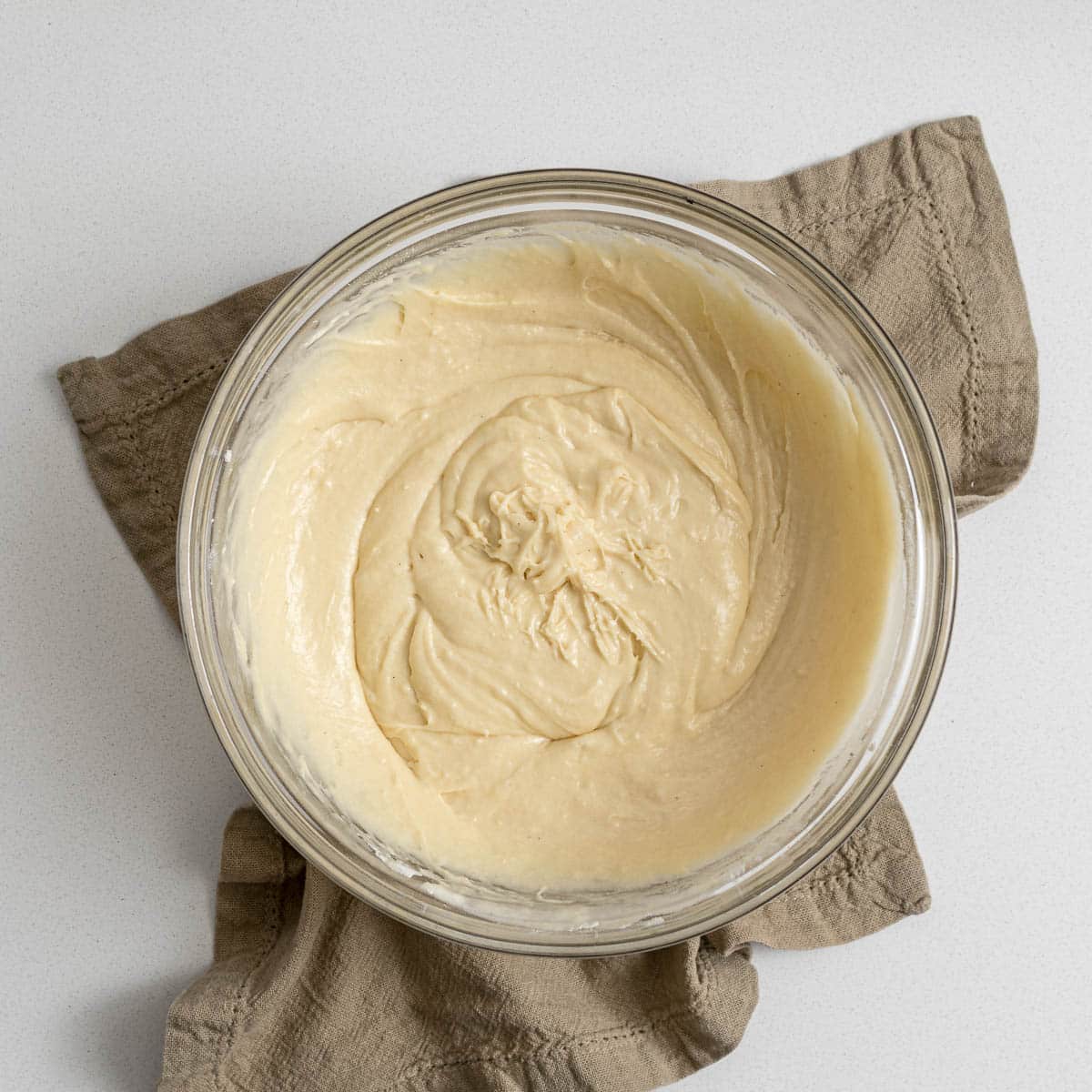 Vanilla cake batter in a bowl.