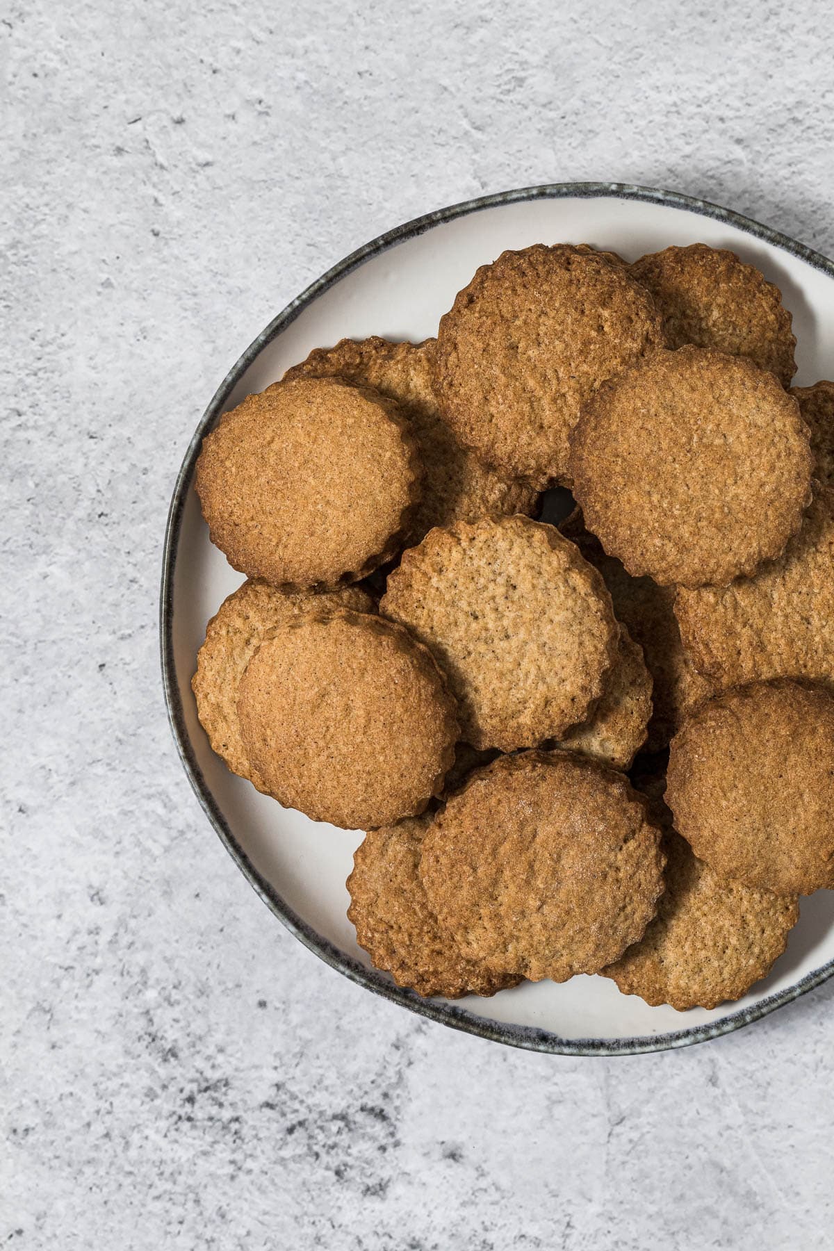 Pile of soetkoekies on a plate.