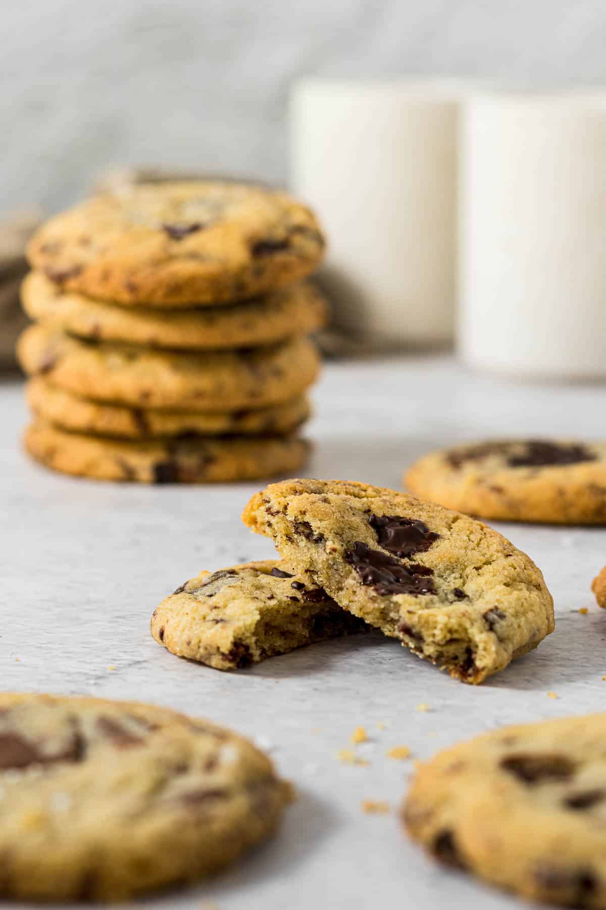 Chocolate chip cookie broken in half.