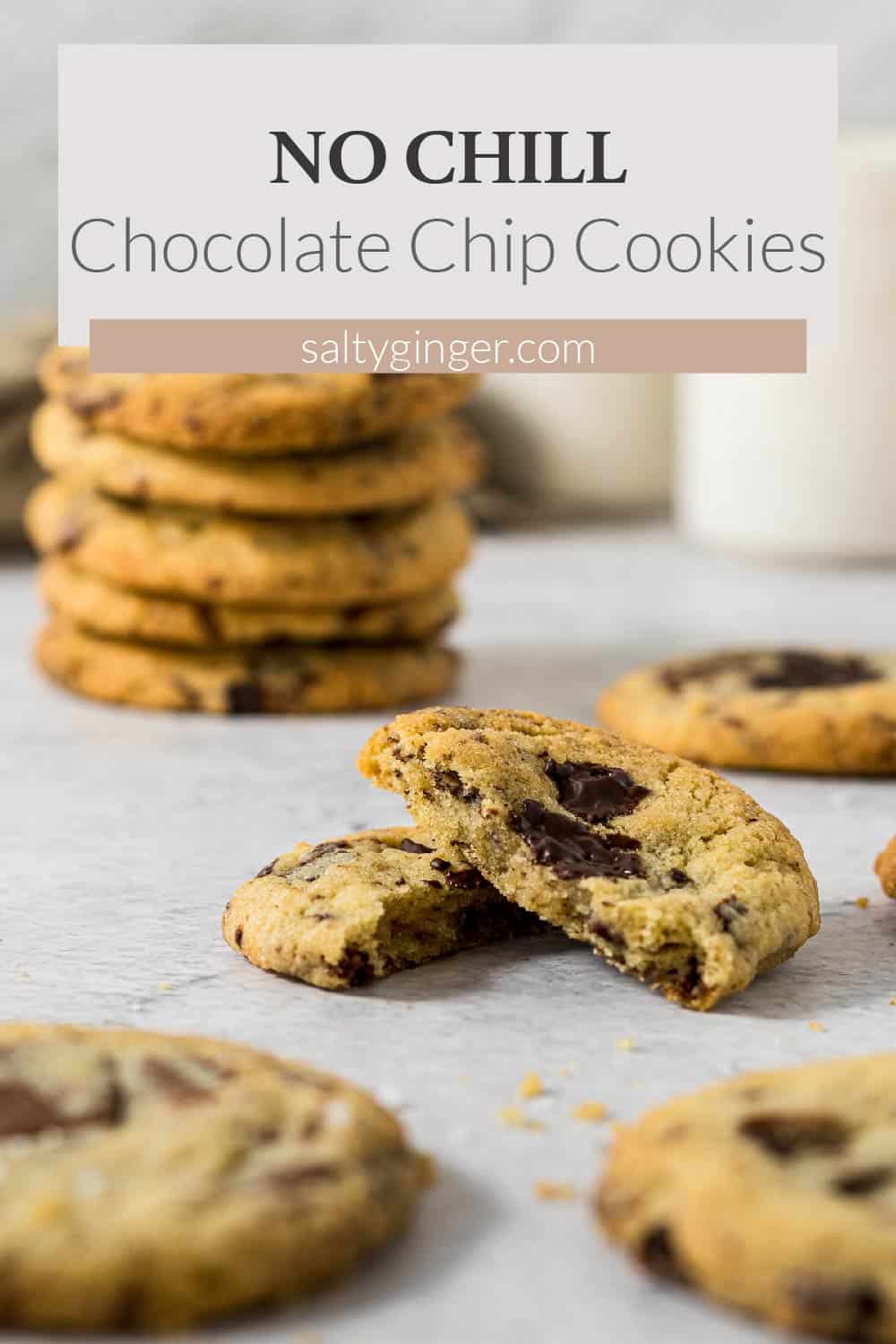 Chocolate chip cookie broken in half.