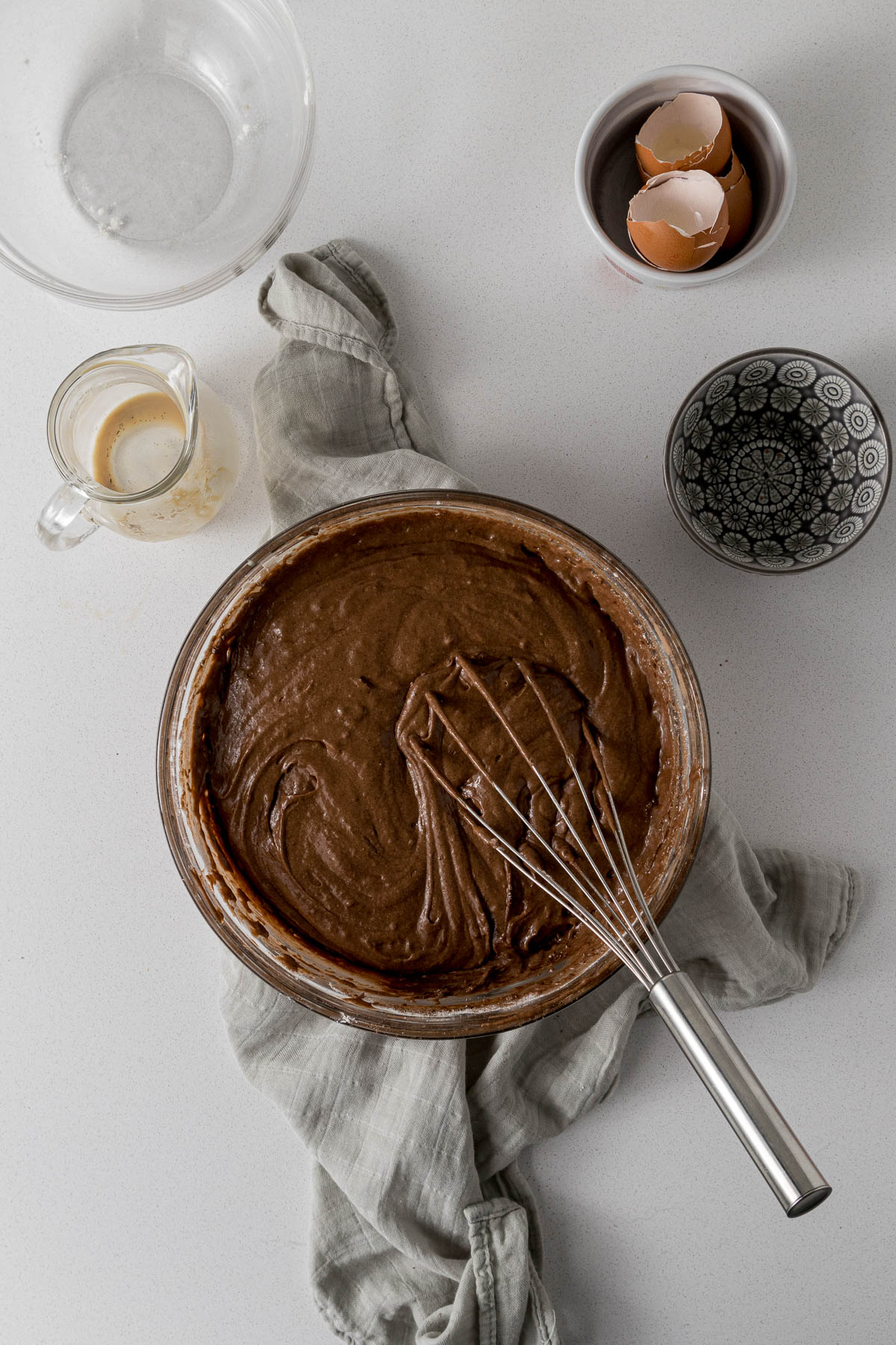Chocolate cake batter in a mixing bowl.