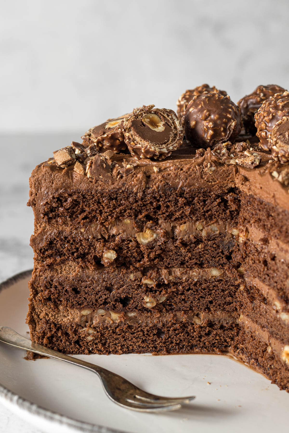 Sliced Ferrero Rocher Cake on a plate.