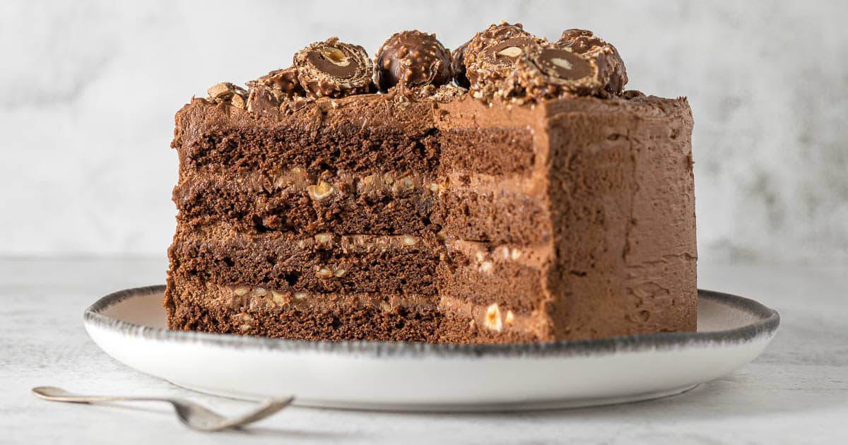 Sliced Ferrero Rocher Cake on a plate.