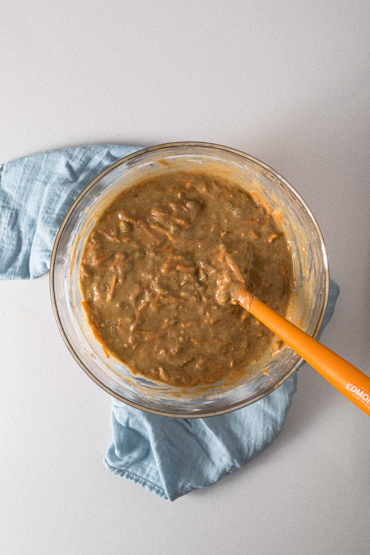 Carrot cake batter in a large bowl.
