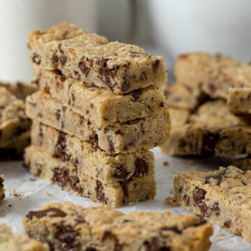 Sliced chocolate chip shortbread stacked on each other.