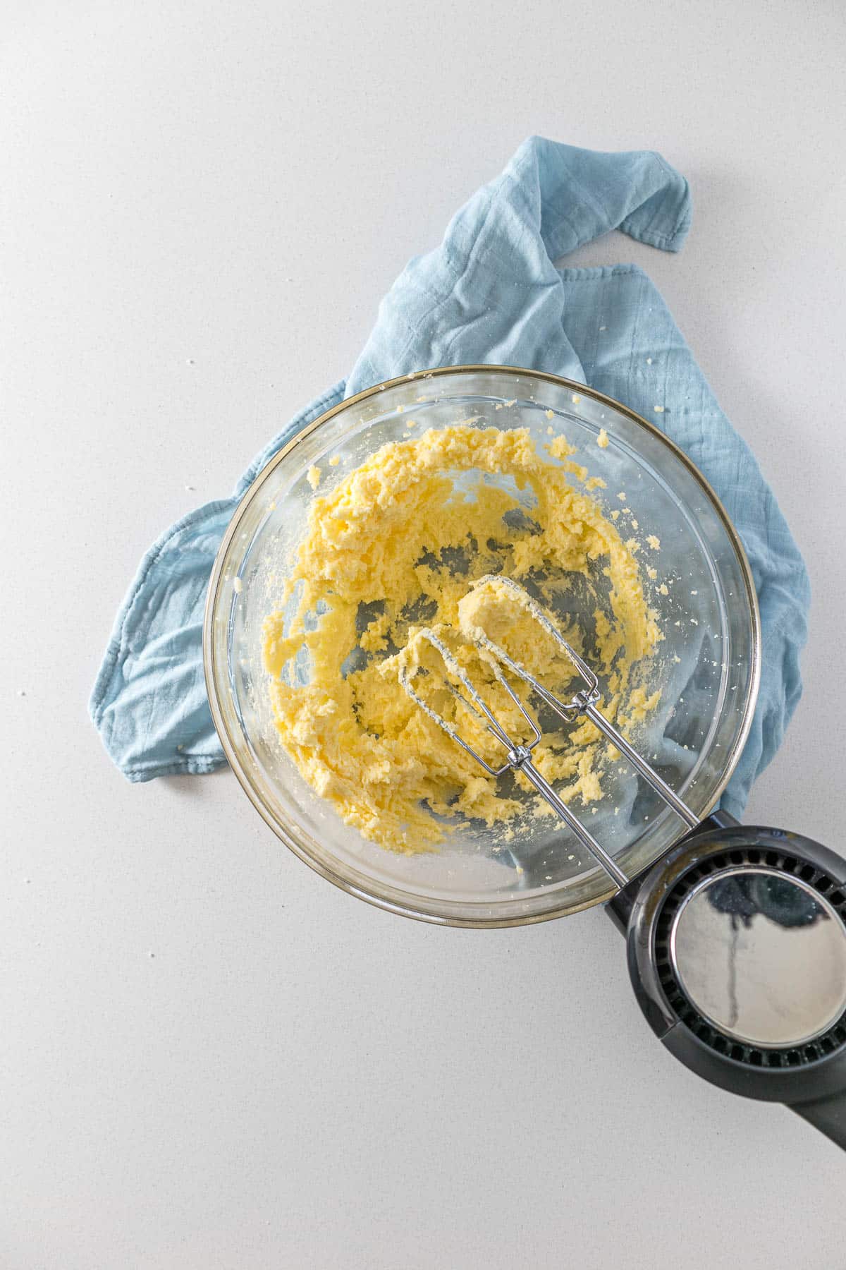 Creamed butter and sugar in a bowl.