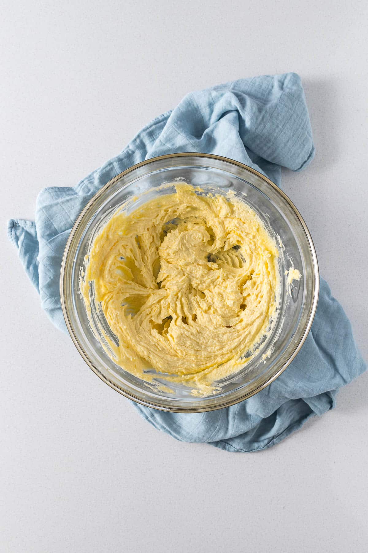 Creamed butter and sugar in a mixing bowl.