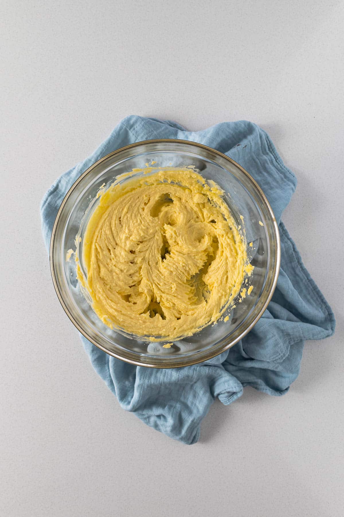 Creamed butter and sugar in a mixing bowl.