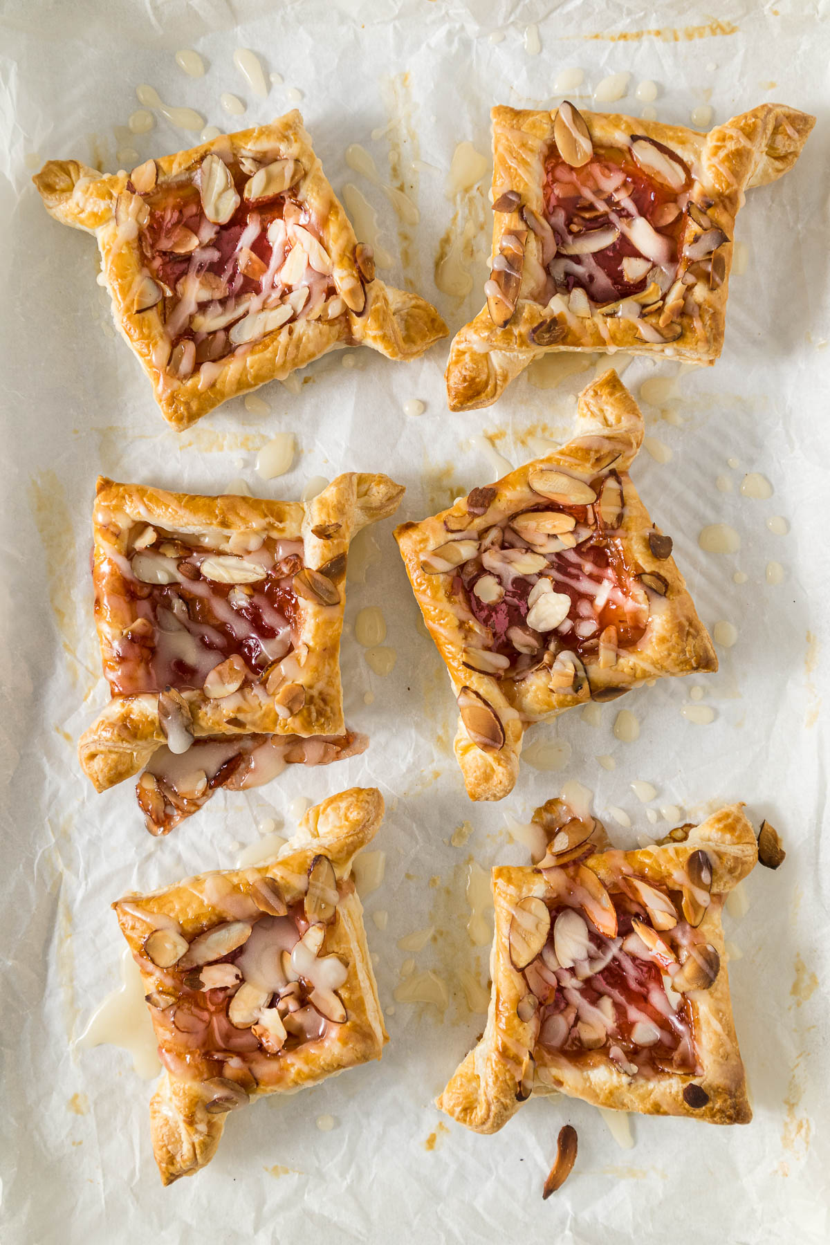 Step 9 - Baked jam puff pastry tarts topped with glaze.
