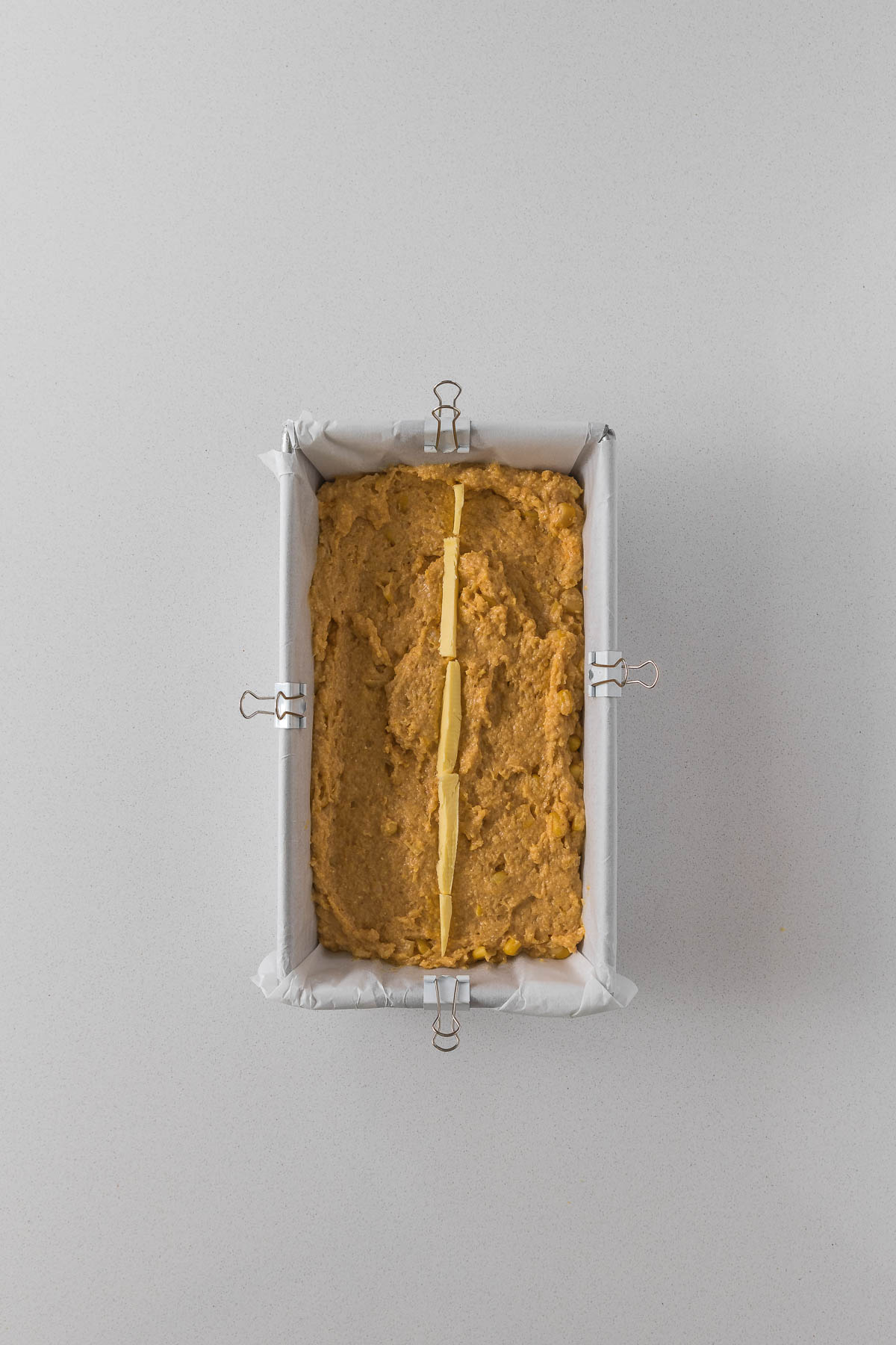 Step 4- strip of butter in the centre of the loaf to allow for a nice rise.