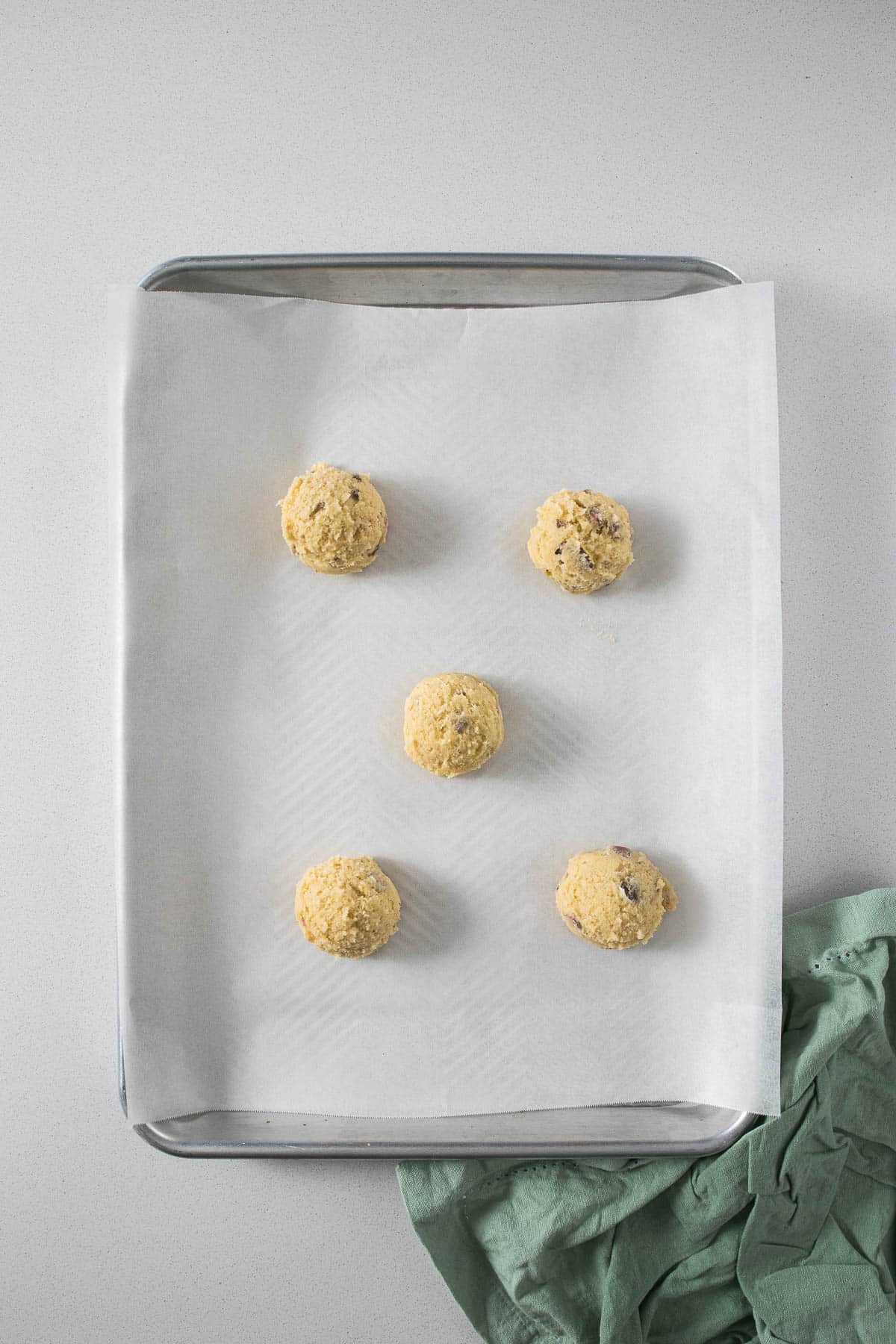 Step 8 - cookies portioned out on a baking sheet.