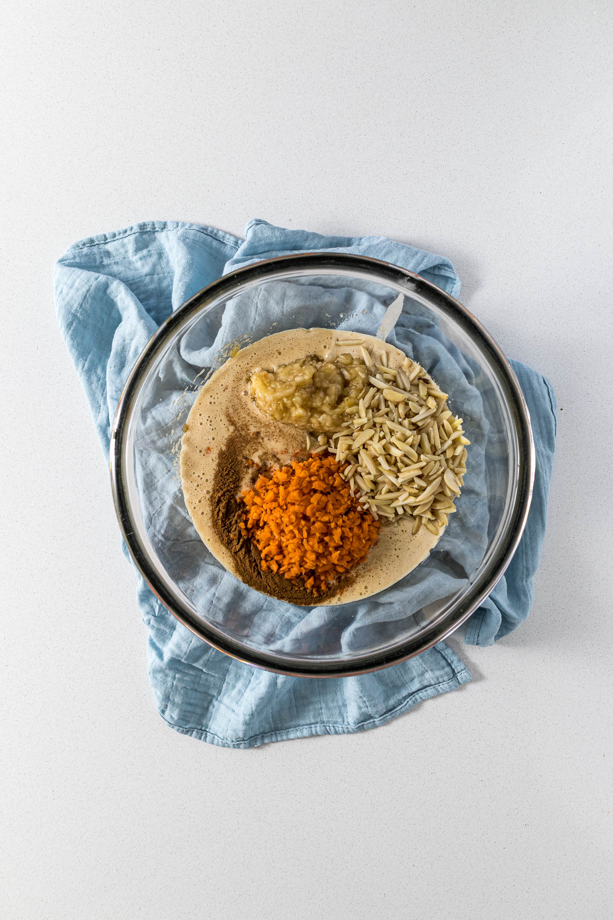 Step 4 - bananas, carrots, spices and almonds added to the mixture.