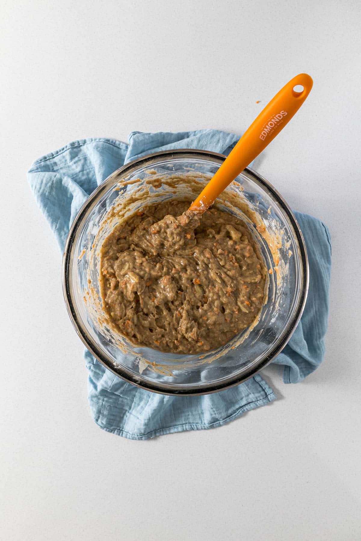 Step 5 - banana carrot muffin batter in a large mixing bowl.