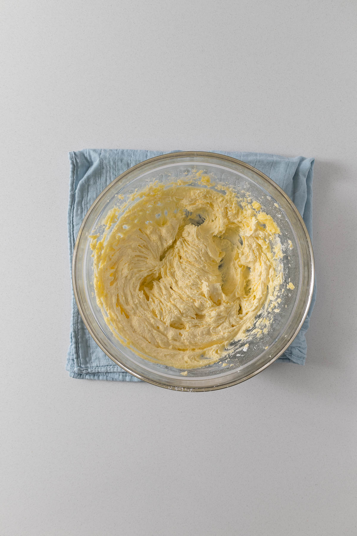 Step 2 - creamed butter and sugars in a mixing bowl.