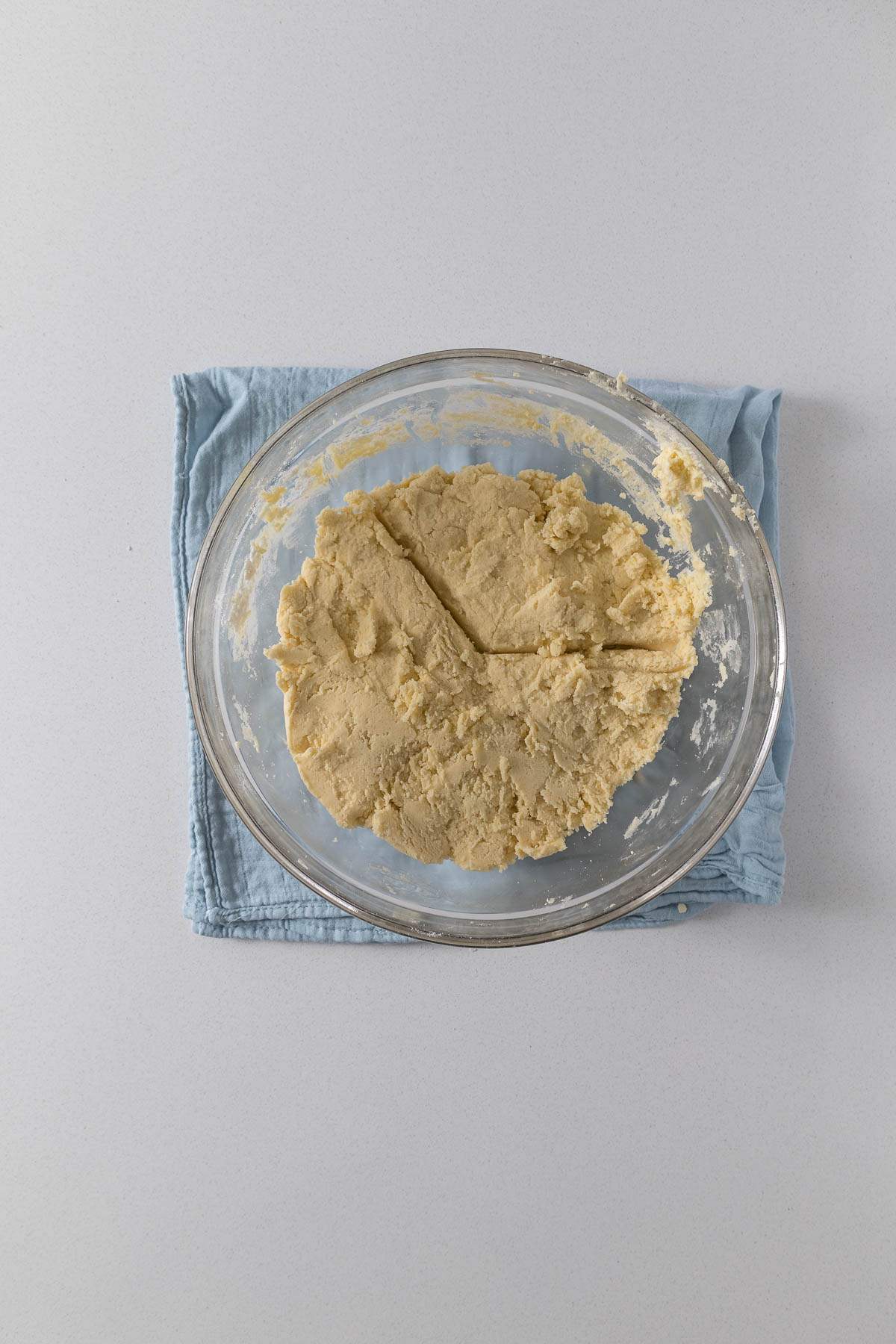 Step 4 - shortbread dough divided into thirds in a mixing bowl.