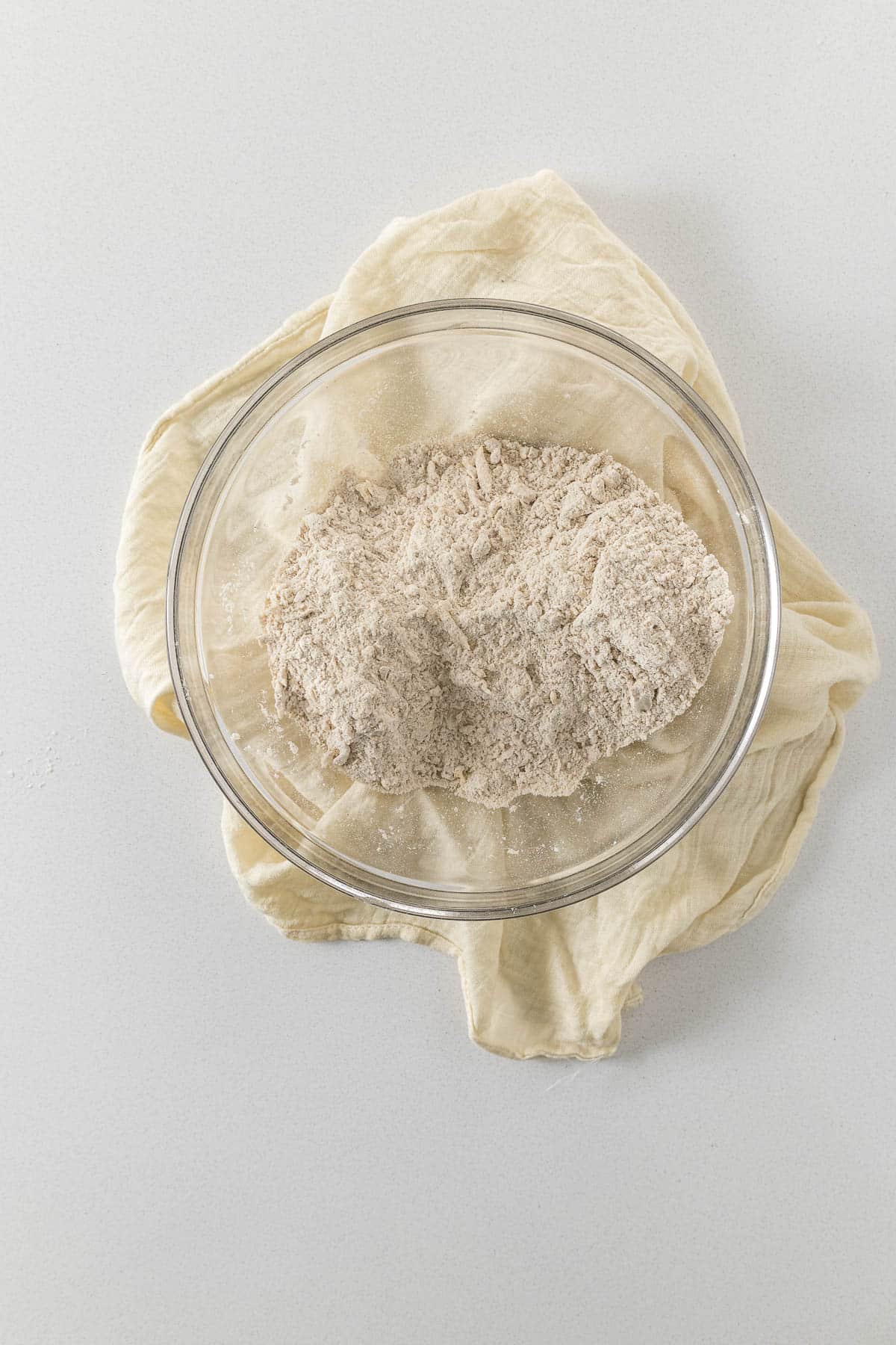 Step 3 - Butter rubbed into the flour until the largest pieces are the size of a pea.
