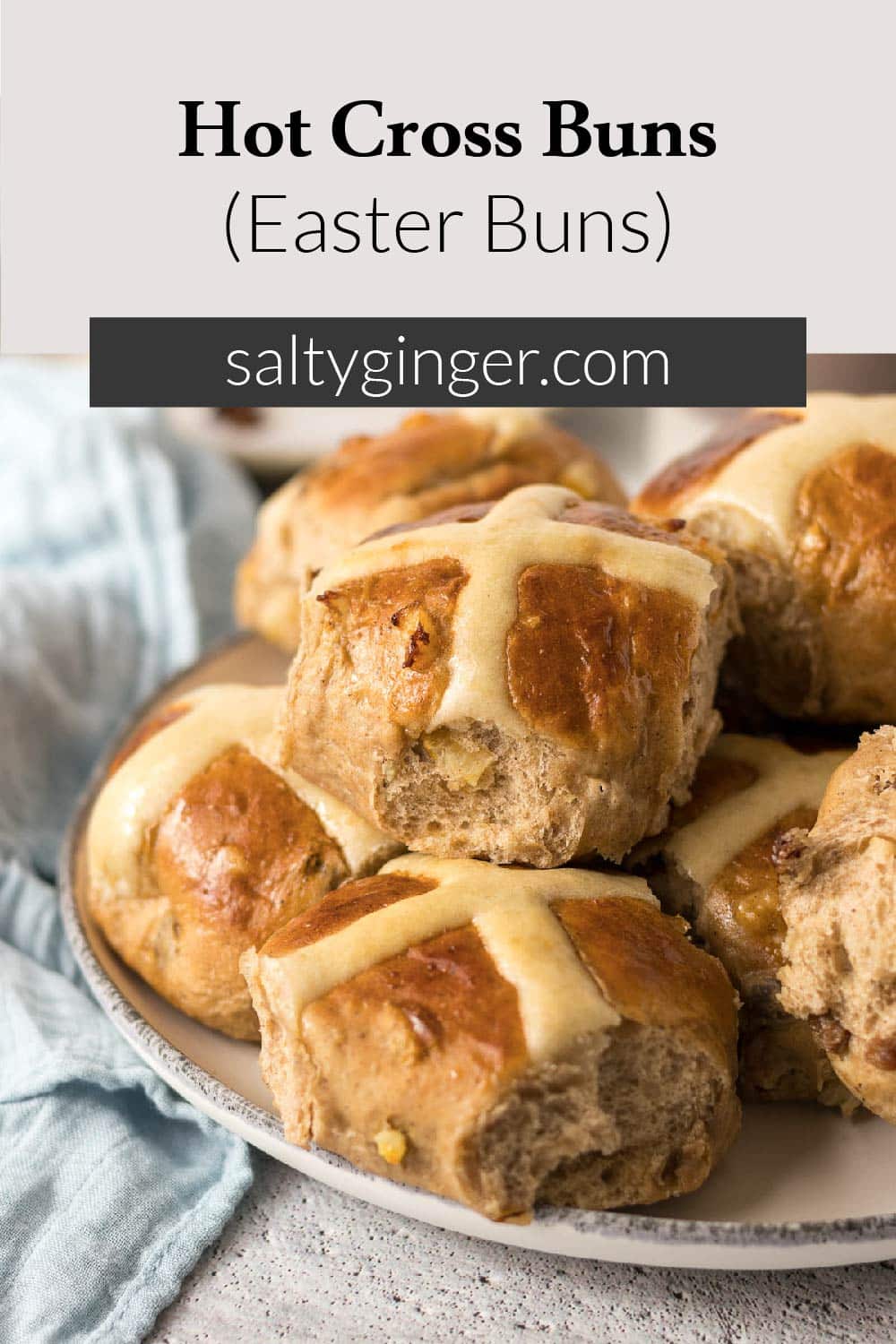Plate with a pile of hot cross buns.