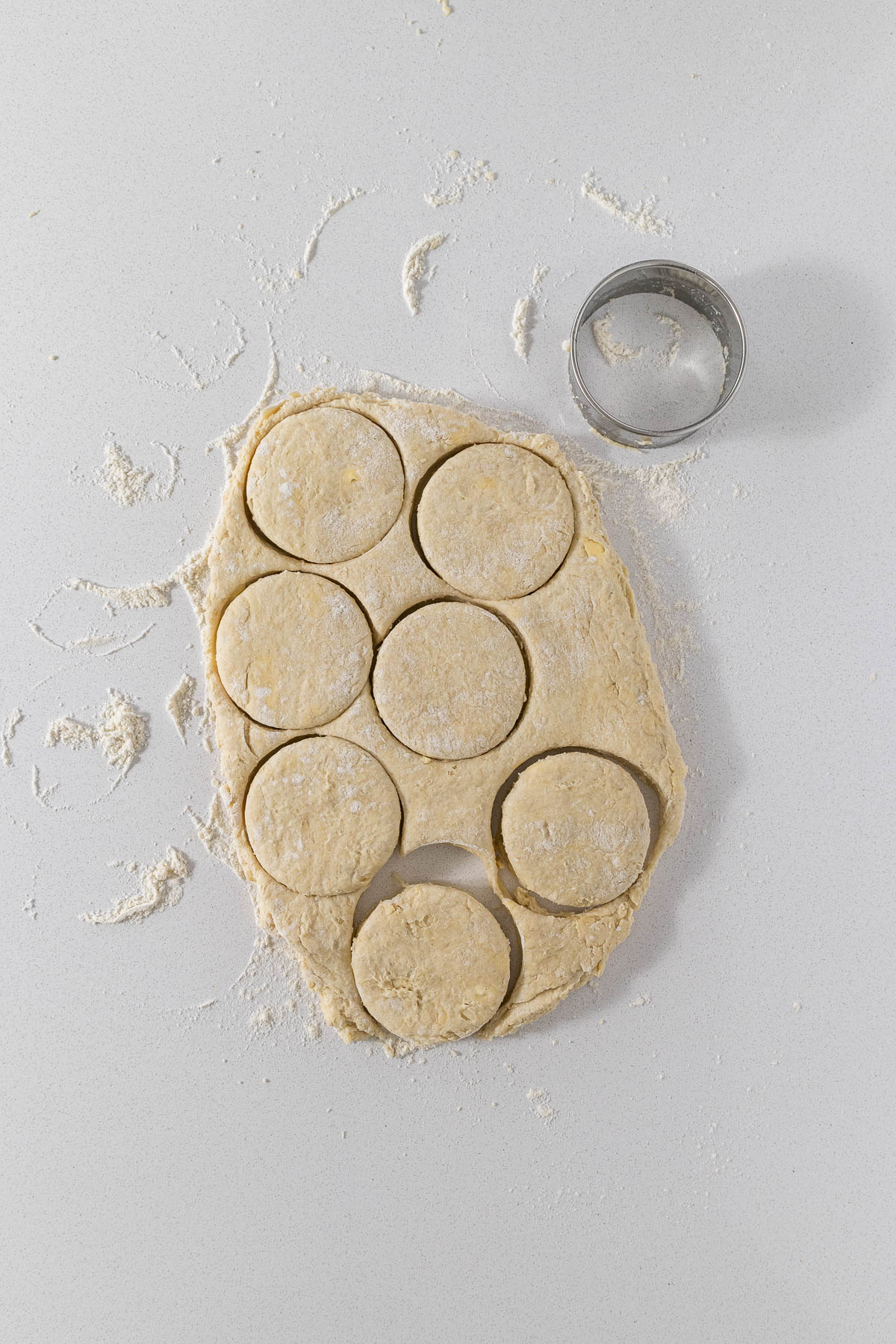 Step 7 - scone dough rolled and rounds being cut from the dough.