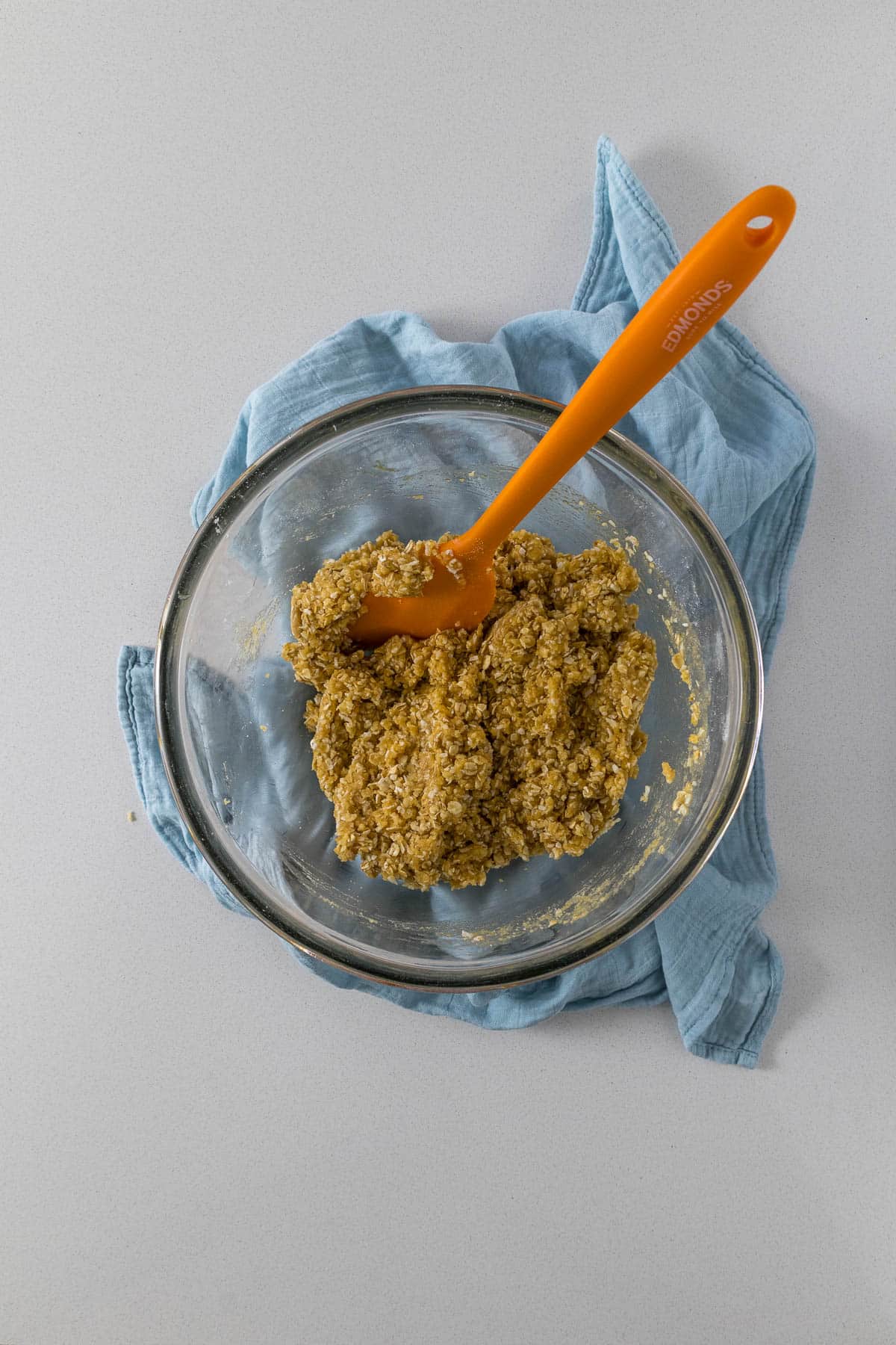 Step 6 - ANZAC biscuit dough in a mixing bowl.