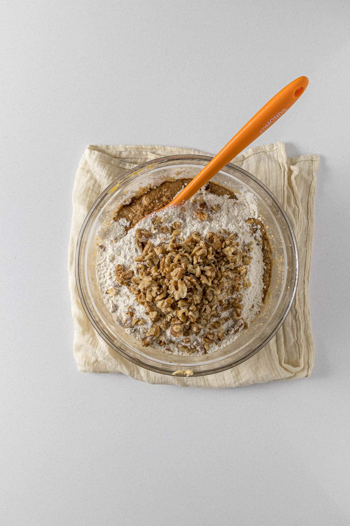 Step 6 - flour, baking powder, salt, walnuts and coffee added to the cake mixture.