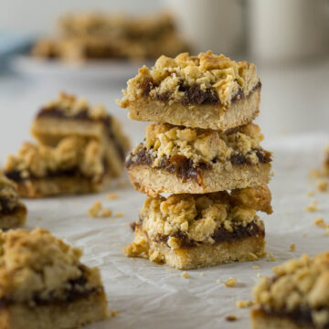 Stack of date and oat slices on top of each other.