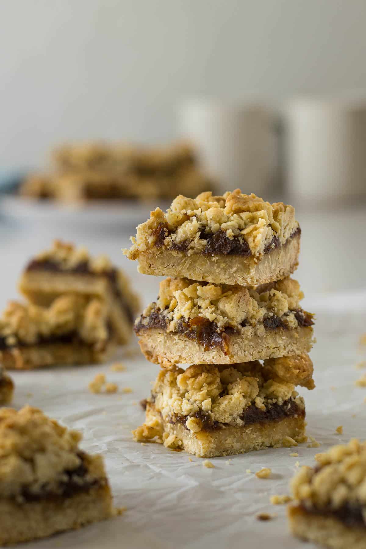 Stack of date and oat slices on top of each other.