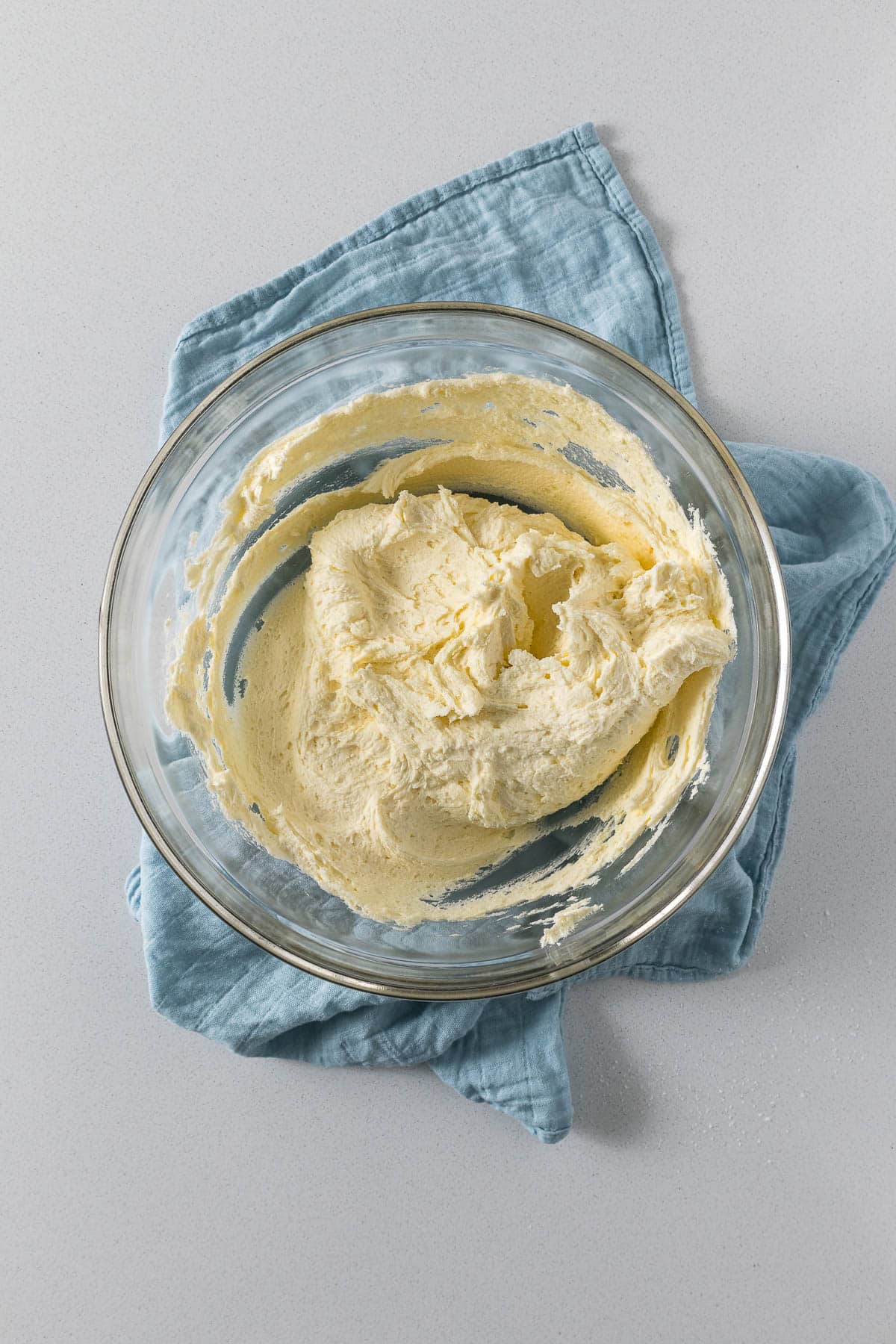 Step 6 - whipped buttercream frosting in a large mixing bowl.