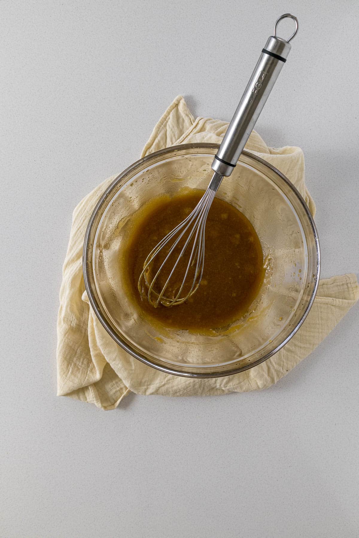 Step 2 - melted butter and sugar whisked together.