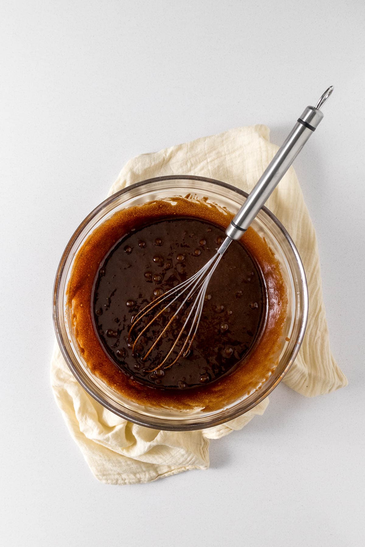 Step 4 - Eggs and vanilla whisked into the chocolate mixture.