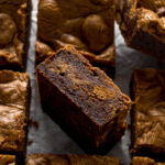 Sliced Biscoff brownie showing the cookie and biscoff swirls.